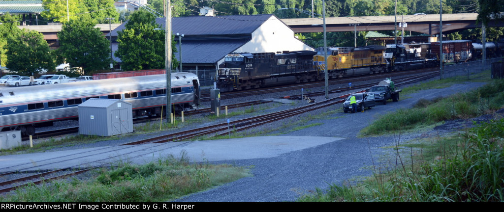 NS train 13R tied down on track 2.  Amtrak Regional 171(14) tied down on the storage track and the honey dipper.